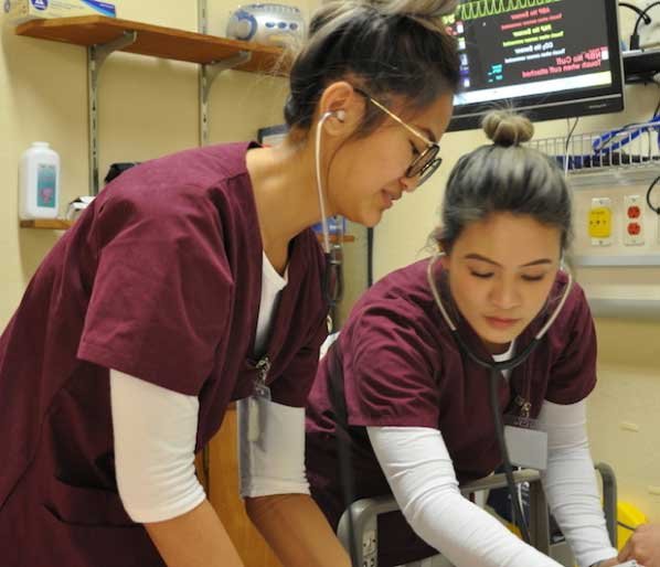 Nursing students in scrubs